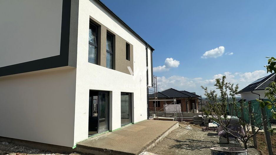 Casă single modernă, eficientă energetic și curte generoasă - Poză 3