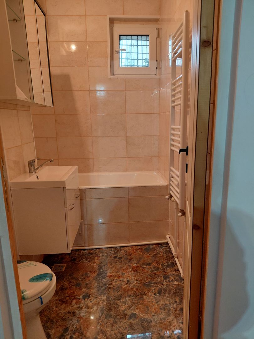 De inch iriat apartament 2 cam dec – Zona Baia Comunală, parter - Poză 6