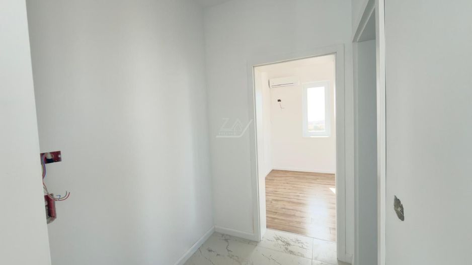 Bloc finalizat. Terasa 55 mp. Clima. Loc de parcare. - Poză 9