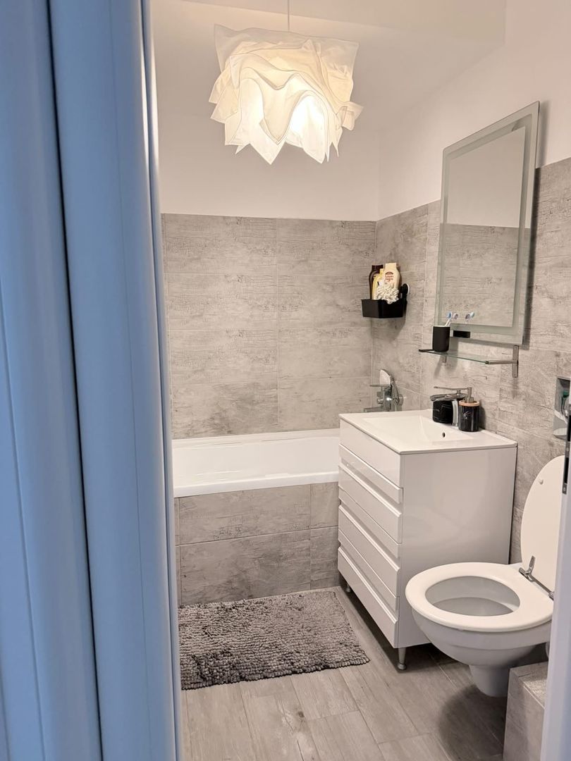 Apartament 2 camere,suprafata generoasa,mobilat si utilat,loc de parcare subtera - Poză 18