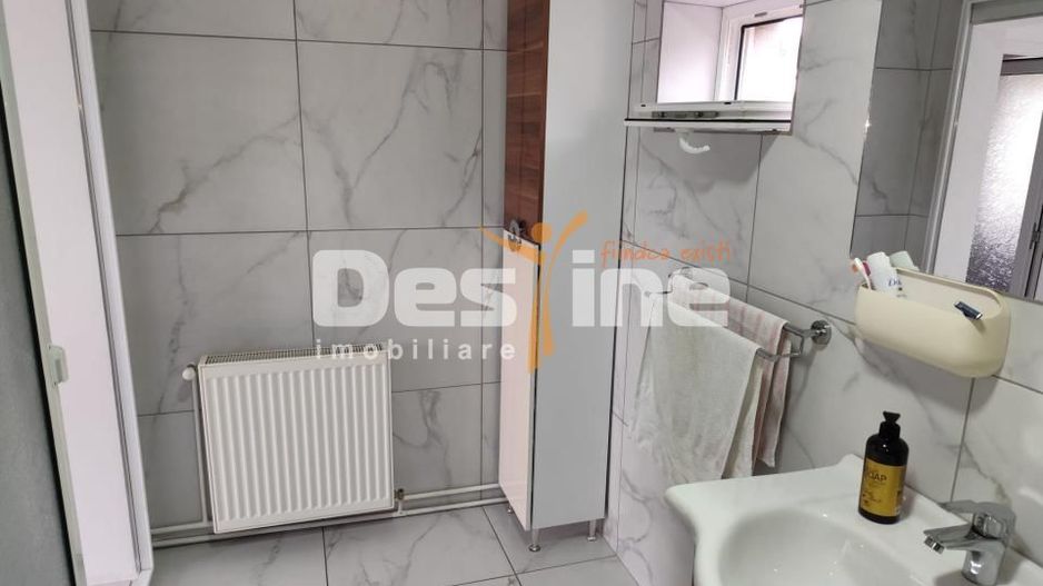 Casa Baicoi Central 125 mp s.u. 1364 mp teren. - Poză 8