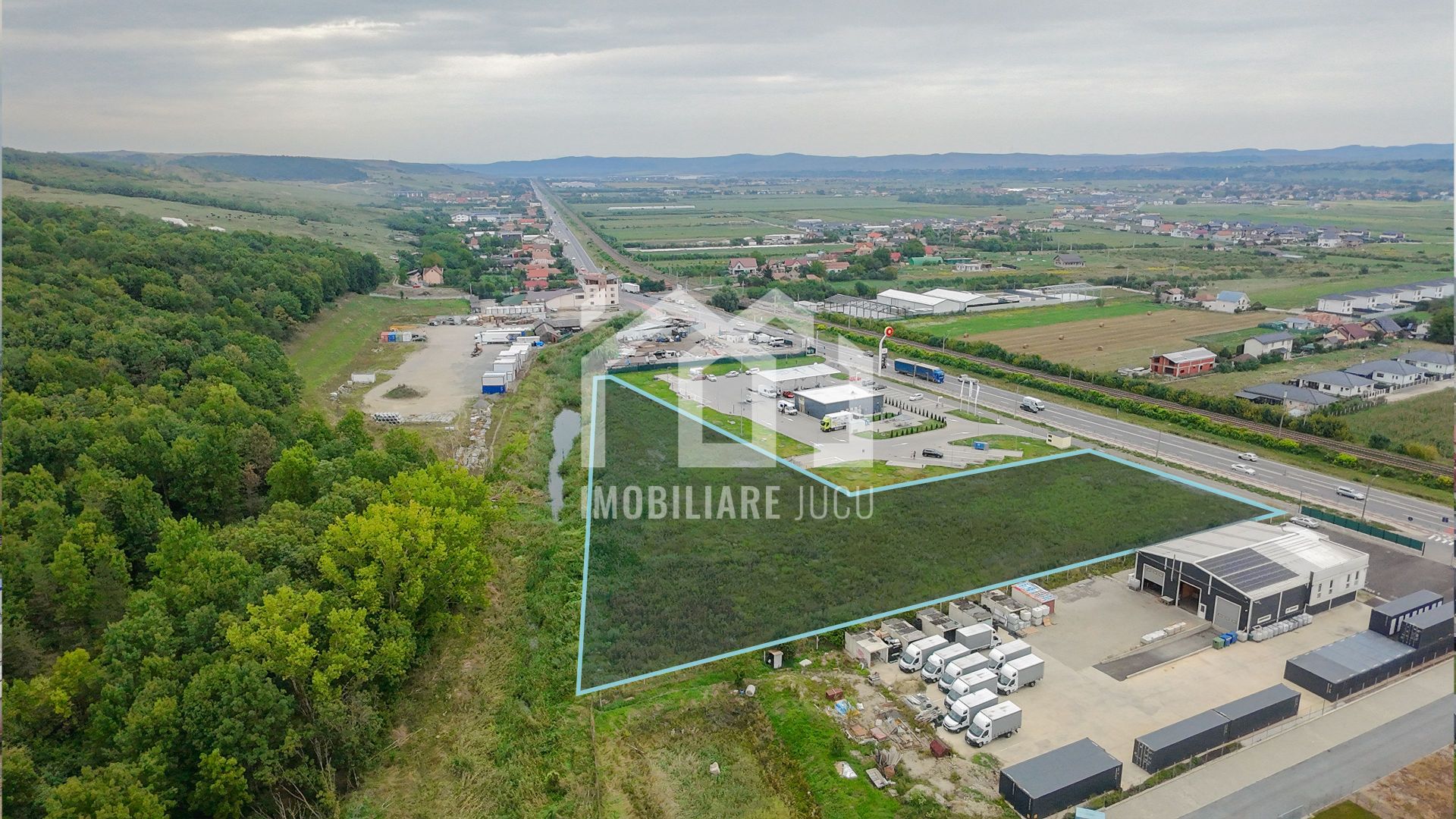 Teren intravilan 9.410 mp – Jucu de Mijloc – Front la DN1 - Poză 1