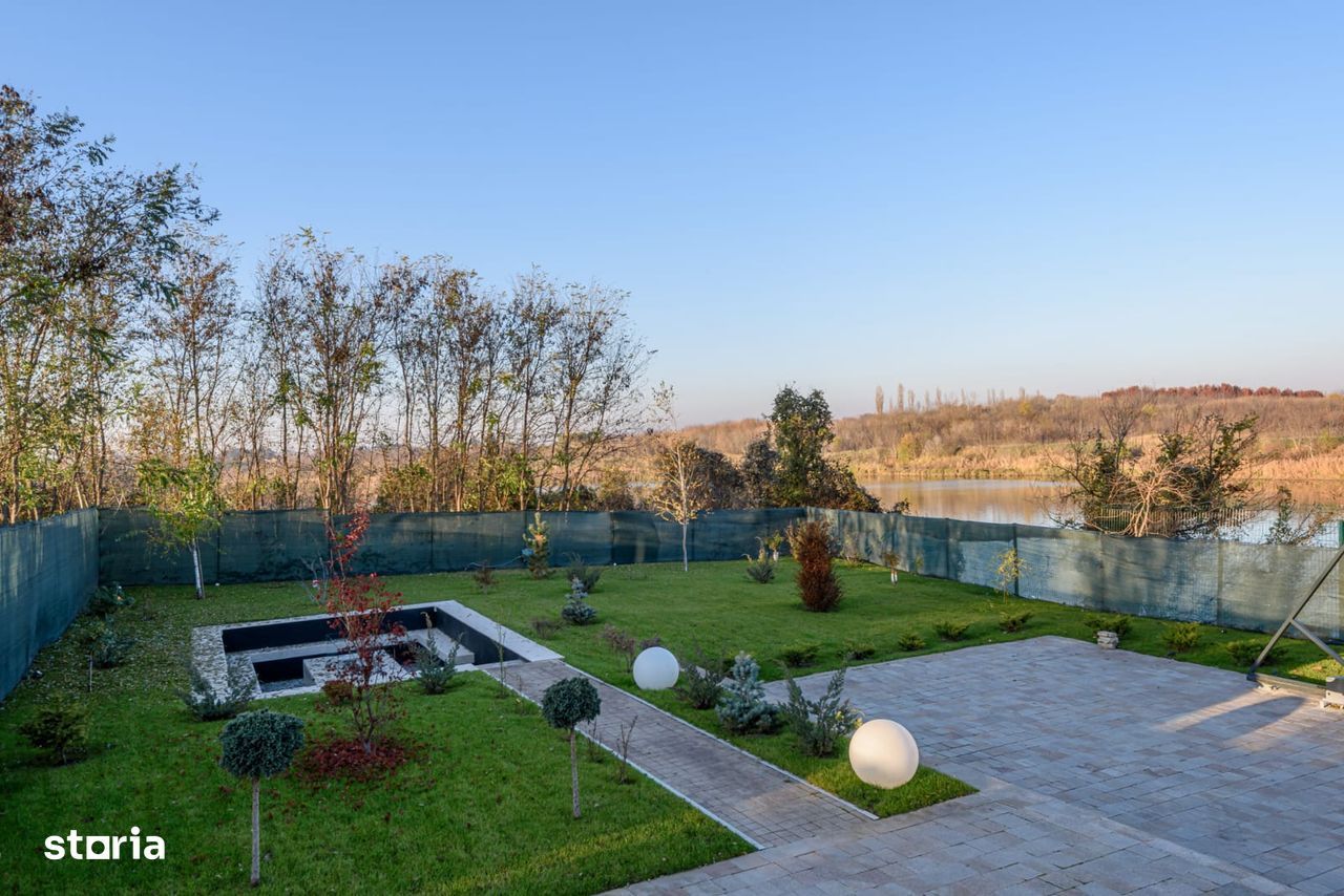 Casa in sistem smart home pe malul lacului Buftea de inchiriat - Poză 14