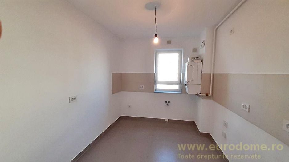Cartier Coresi, apartament nou, nemobilat 400 euro - Poză 6