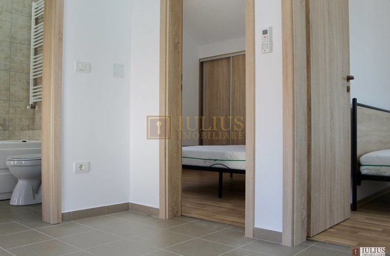 2 dormitoare, 80 mp utili, gradina si curte proprie de 300mp. - Poză 7