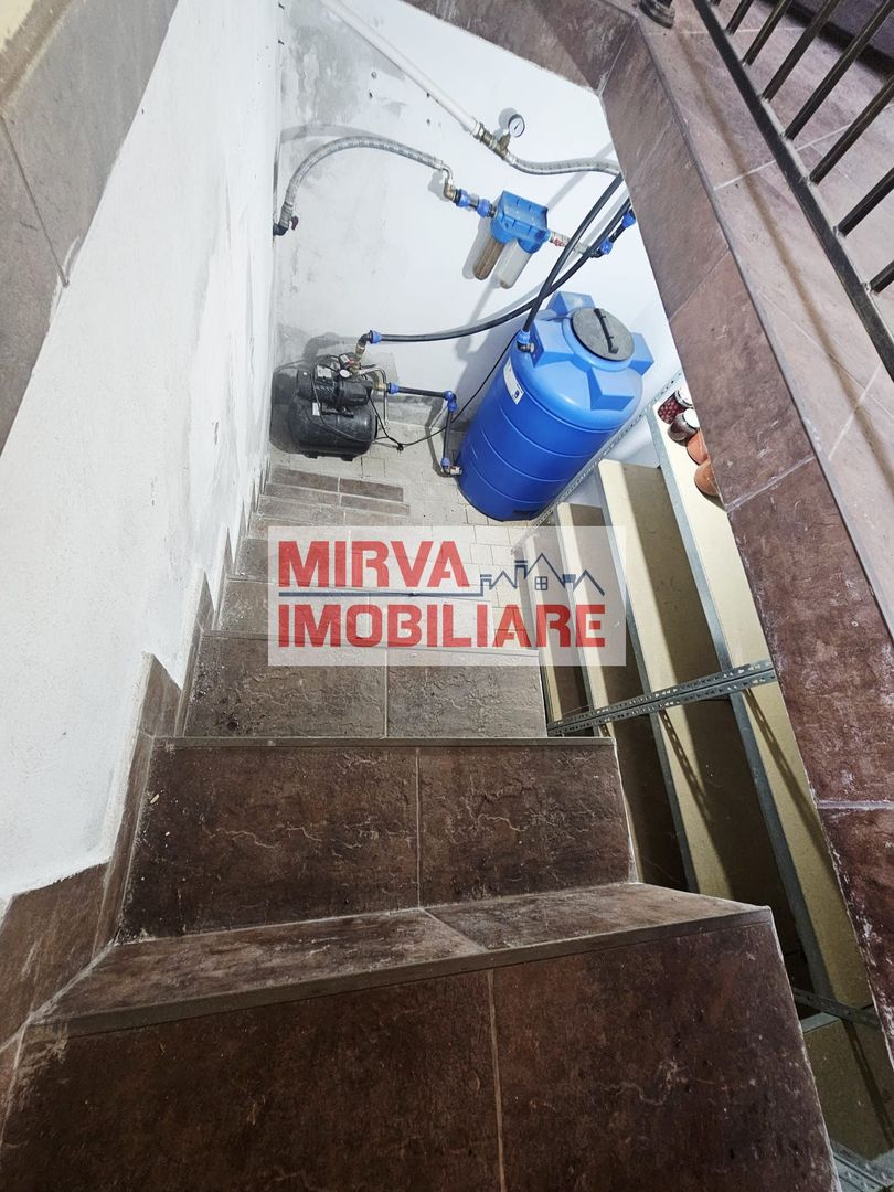 Vilă spațioasă Strejnicu S+P+1E+M, 8 camere, garaj, teren 595 mp - Poză 14