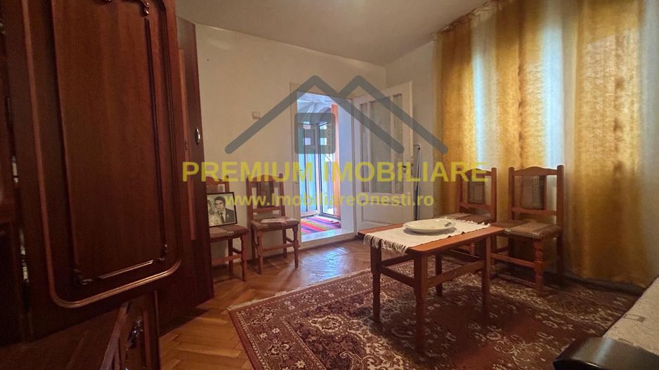 Casă batraneasca+ teren 999 mp intravilan în Oituz - Poză 4