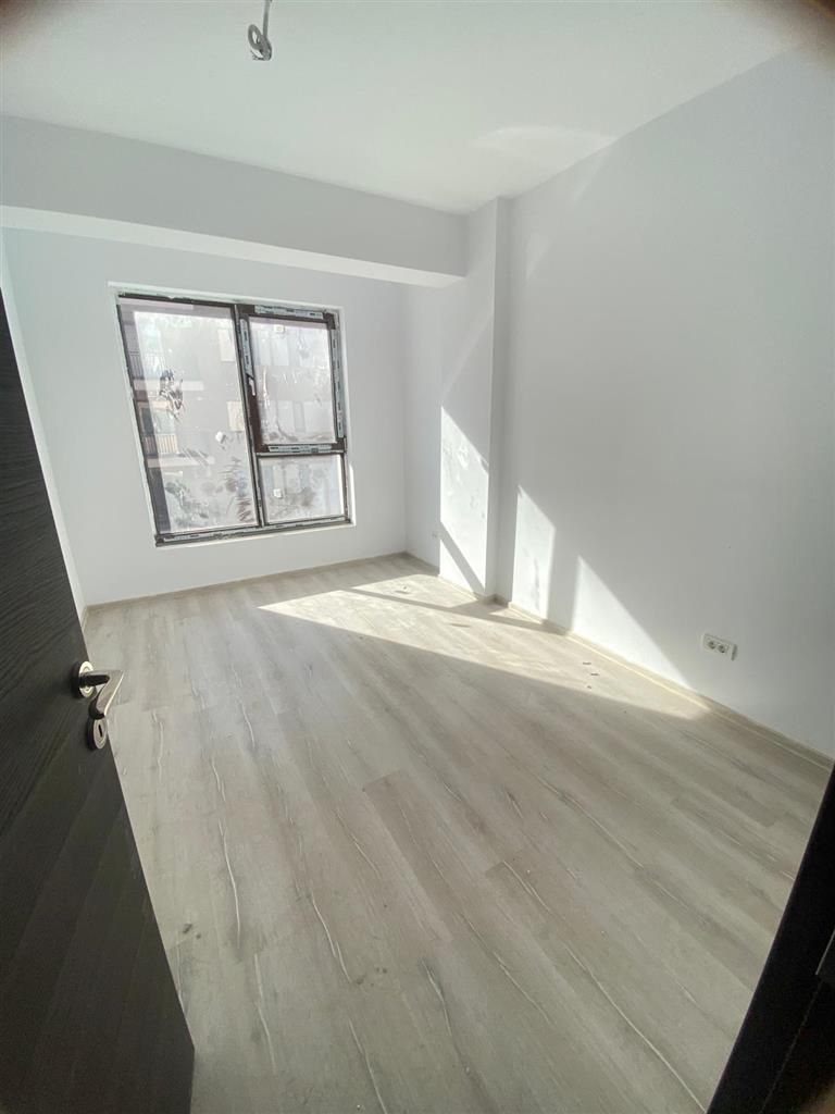 Apartament 2 camere bloc nou open space loc de parcare parter - Poză 1