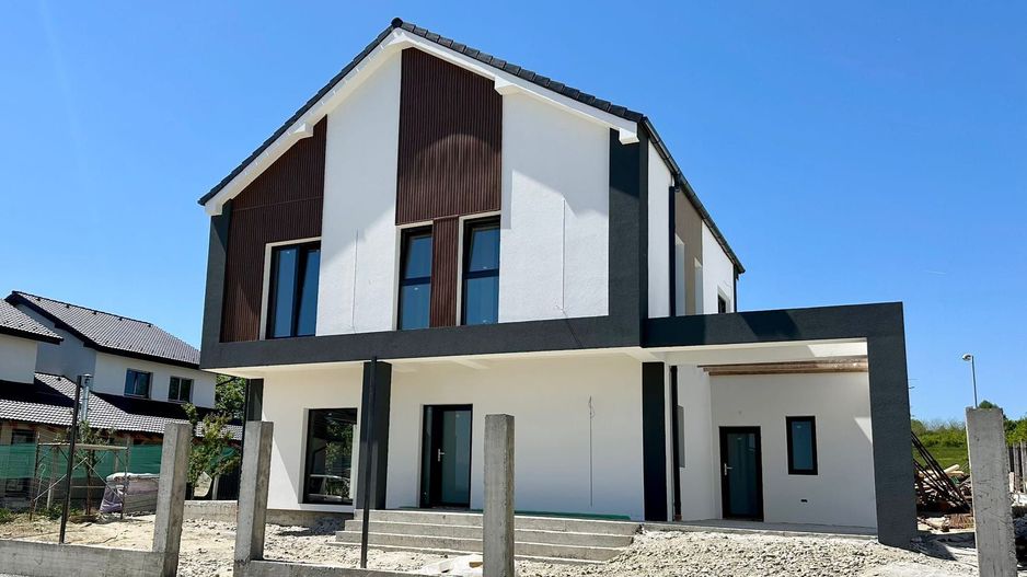 Casă single modernă, eficientă energetic și curte generoasă - Poză 1