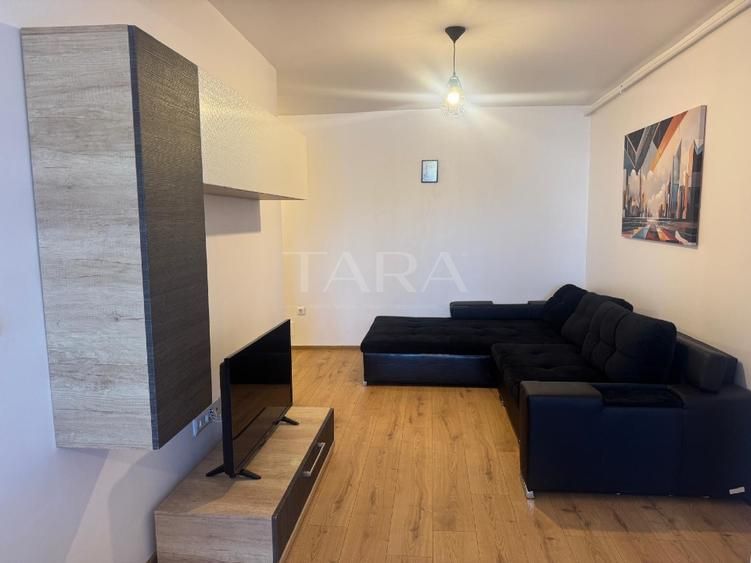Apartament modern cu 2 camere, parcare subterană inclusă. - Poză 2