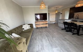 Apartament 2,5 camere chic cu grădină balcon vitrat și mobilier premium