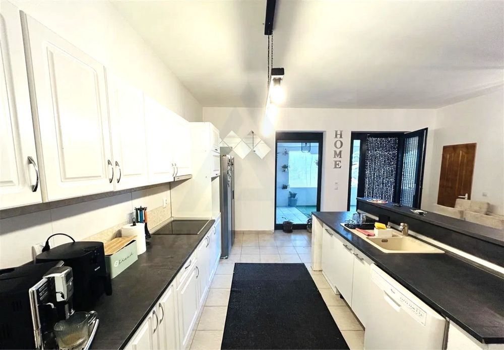 Casă 180 mp utili teren 710 mp panouri solare si hala in Sura Mare - Poză 4