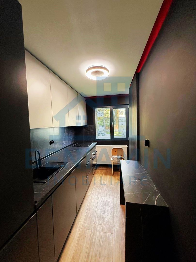 Garsoniera-decomandata-parter-finisaje-moderne-mobilata-utilata-liber - Poză 3