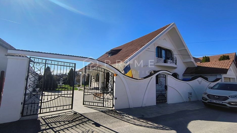 Casa perfectă pentru familie – curte, foișor cu grătar și garaj triplu - Poză 2