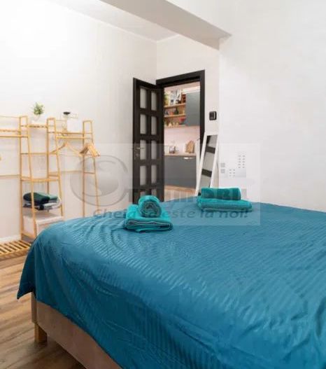 2 cam SD Royal Town, 56 mp, 2 balcoane, parcare, mobilat ,169.000 € - Poză 10