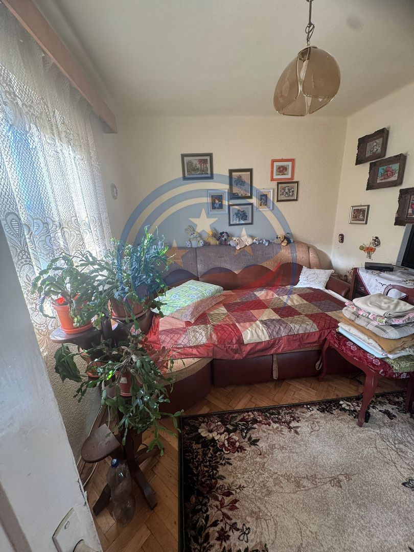 🌿 Casă cu teren 620 mp – Romanești | Liniște, acces excelent, potențial mare - Poză 7