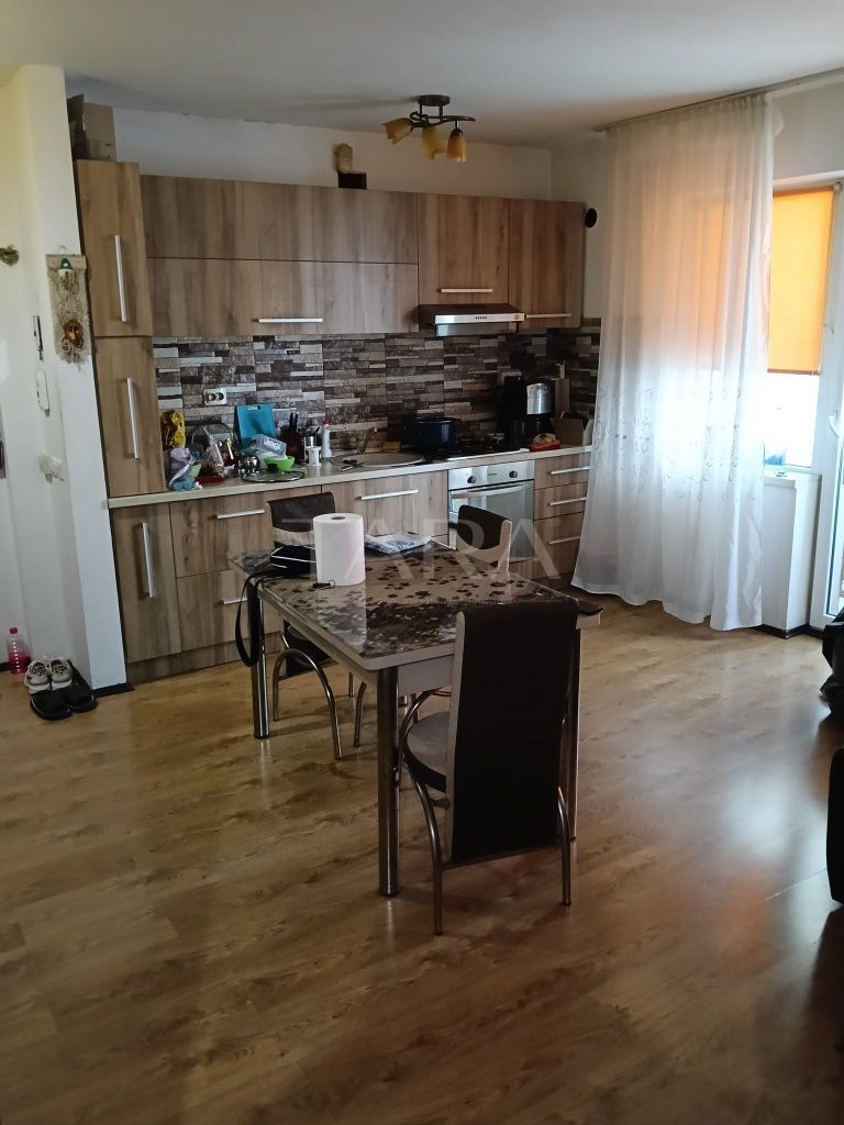 Apartament cu 3 camere, 2 balcoane și parter inalt în Florești. - Poză 1