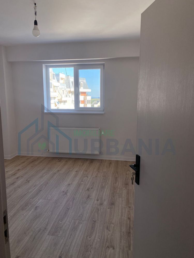 Apartament cu 2 camere în centrul orașului Pașcani, etaj 2, 67 mp, bloc cu lift - Poză 2