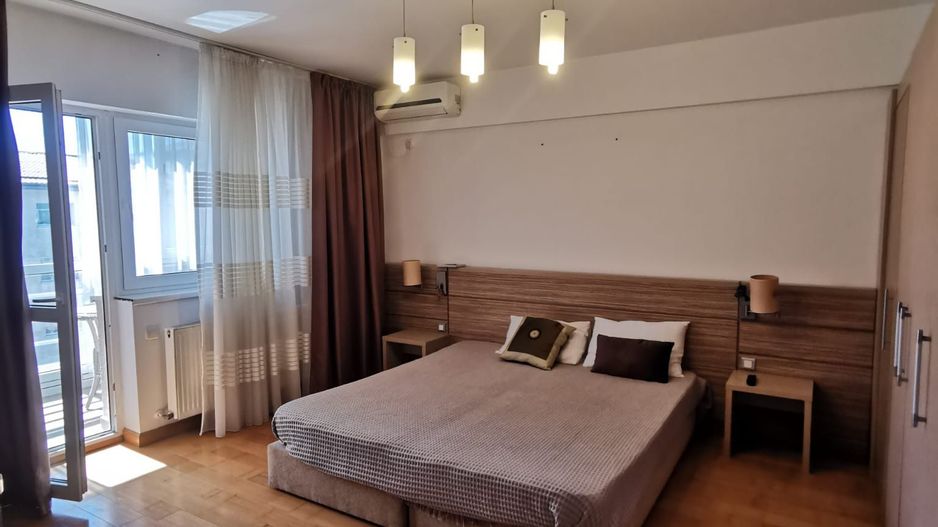 Garsoniera spatioasa mobilata si utilata ideala pt investitie - Poză 9