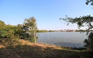 Teren 5963 mp deschidere lac Grivita 42 m cu deschidere la strazi 77 m - Poză 5