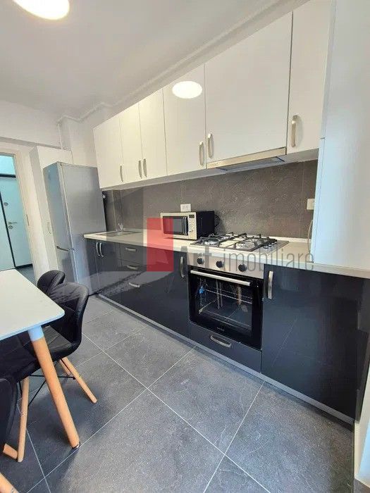 Apartament cu camere de inchiriat-Aparatorii Patriei-centrala+loc de parcare - Poză 6
