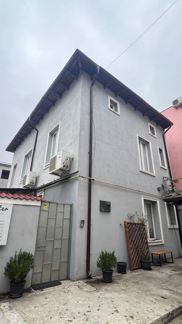 Cladire 23 de camere cu teren 554 mp - Poză 2