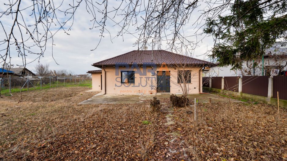 Căsuță renovată modern - Poză 1