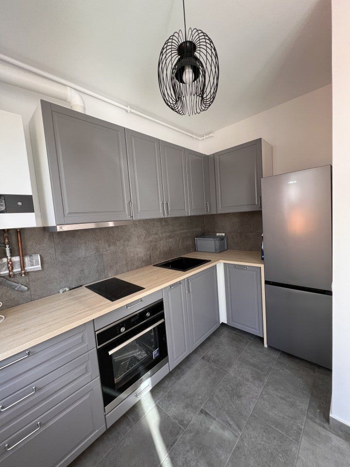 Apartament cu 2 camere si curte proprie 60mp - Poză 2