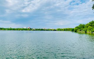 Teren 5963 mp deschidere lac Grivita 42 m cu deschidere la strazi 77 m - Poză 2