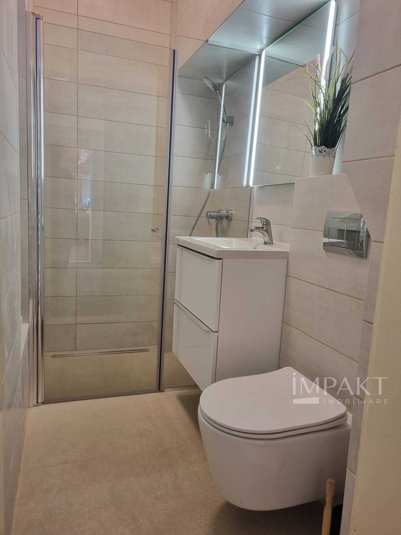 Apartament cu doua dormitoare, doua bai si living langa Piata Unirii - Poză 9