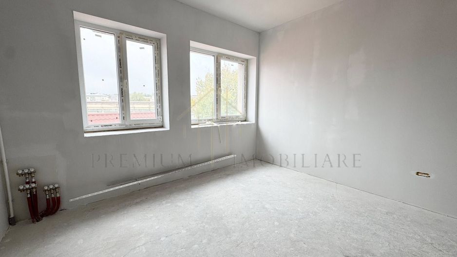 Oportunitate unică de investiție – Etaj complet de vânzare în Onești - Poză 3