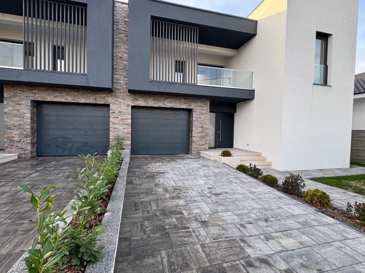 Duplex despărțit prin perete dublu/ Garaj - Poză 2