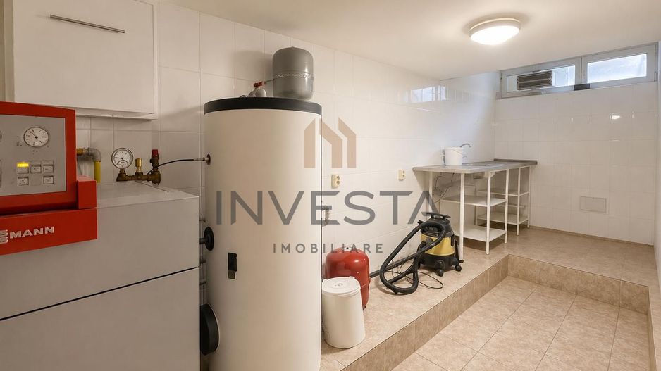 Casa de 360 mp cu sauna si garaj dublu de inchiriat in zona Buna Ziua - Poză 26