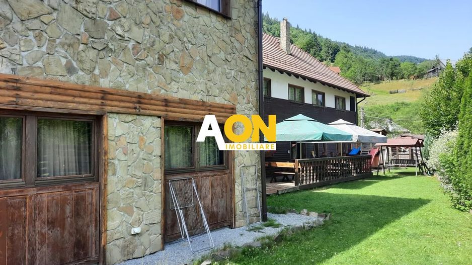 Pensiune in Muntii Apuseni 10 camere 1007 mp teren - Poză 1