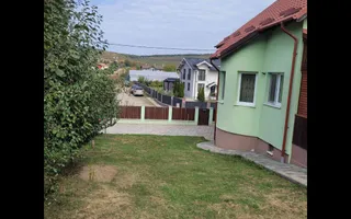 Casă Livezeni 815 mp teren, casa primitoare ,la doar 5 minute de oraș. - Poză 16