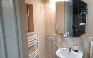 Închiriez garsonieră la casă,  Unirii, centrală proprie - Poză 6