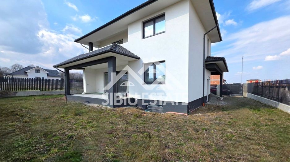 Casa noua 4 dormitoare, 3 bai, pivnita si carport - Poză 2