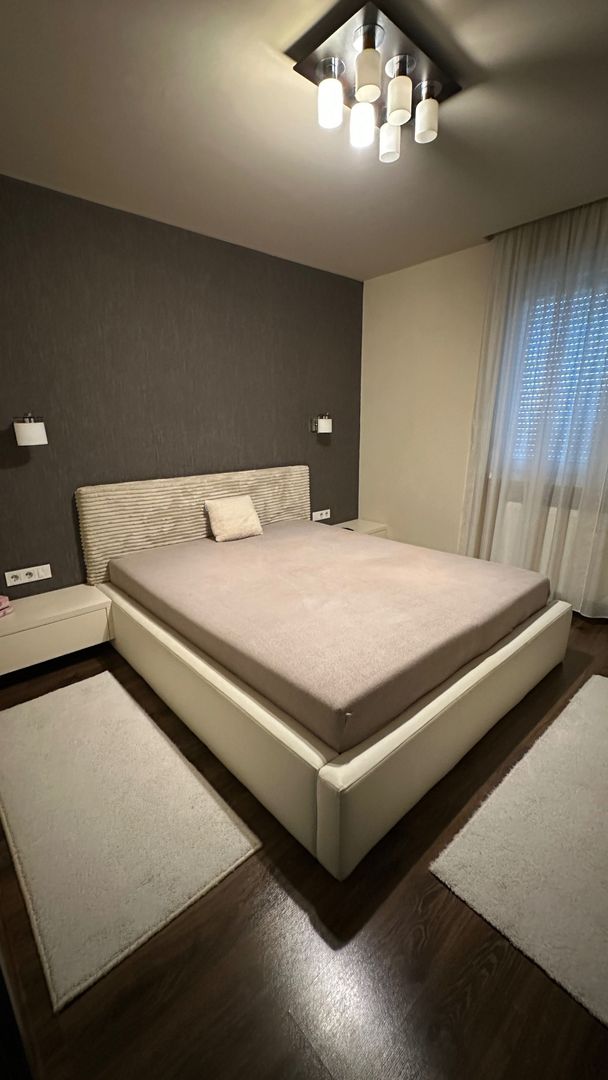 Apartament de vânzare, modern, cu 4 camere, garaj și curte - Poză 4
