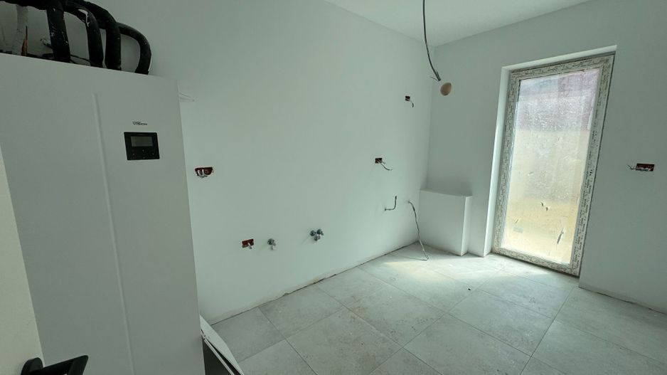 Townhouse modern cu grădină privată într-un cartier verde și sigur - Poză 5