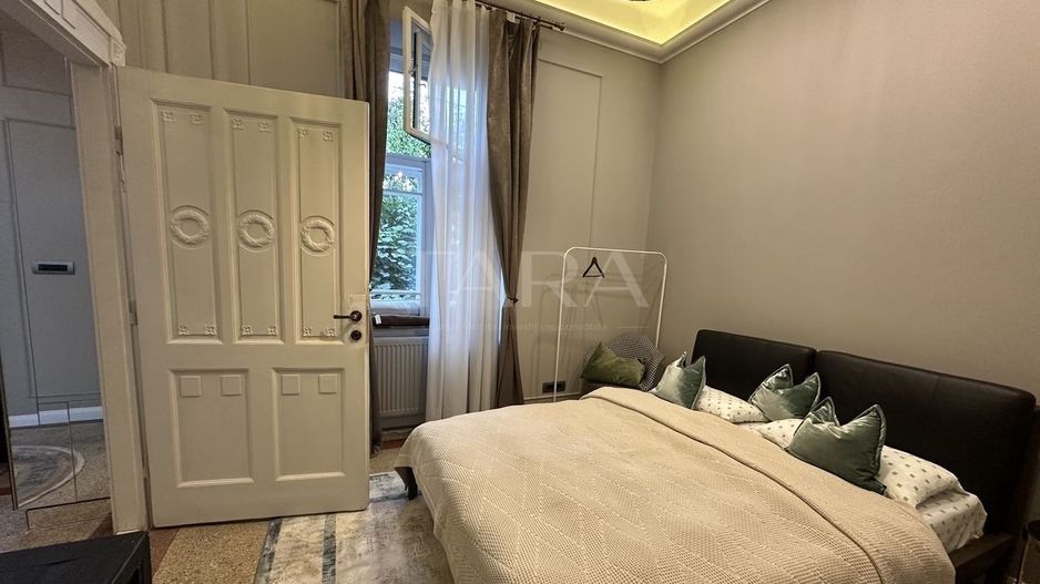 Eleganță, lumină și liniște – 3 camere în inima Clujului - Poză 11