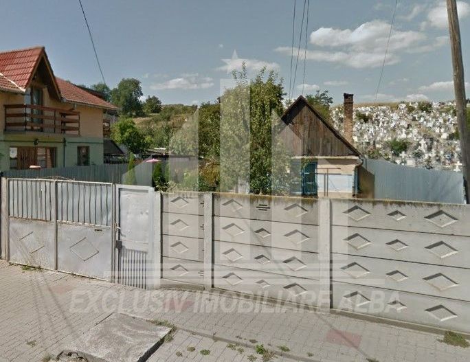 Casa individuala de vanzare cu teren - Poză 1