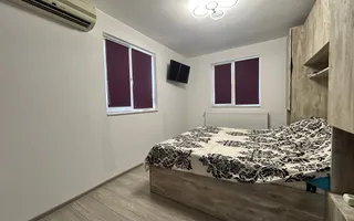 Casă P+1E cu terasă circulabilă, garaj amenajat și finisaje moderne - Poză 17