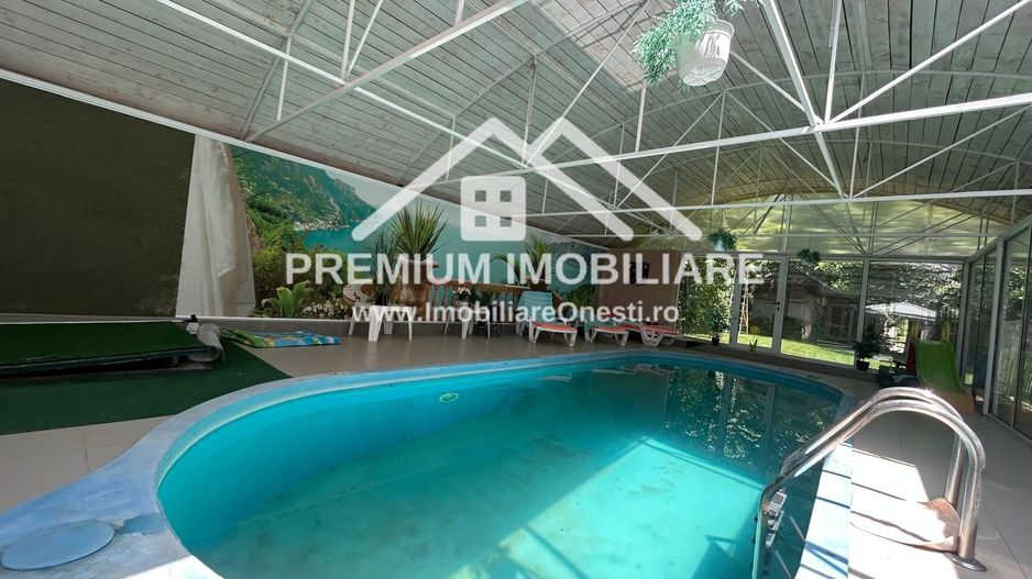 „Vilă cu piscină și teren 1.400 mp în zona Mal, Onești - Poză 14