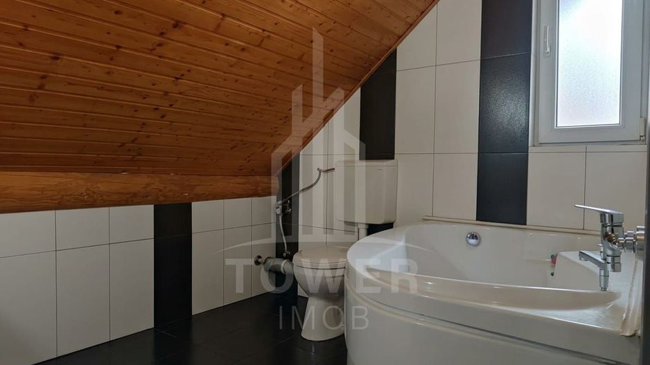 Casă individuală cu 2 apartamente și anexă generos de 100 mp - Poză 16