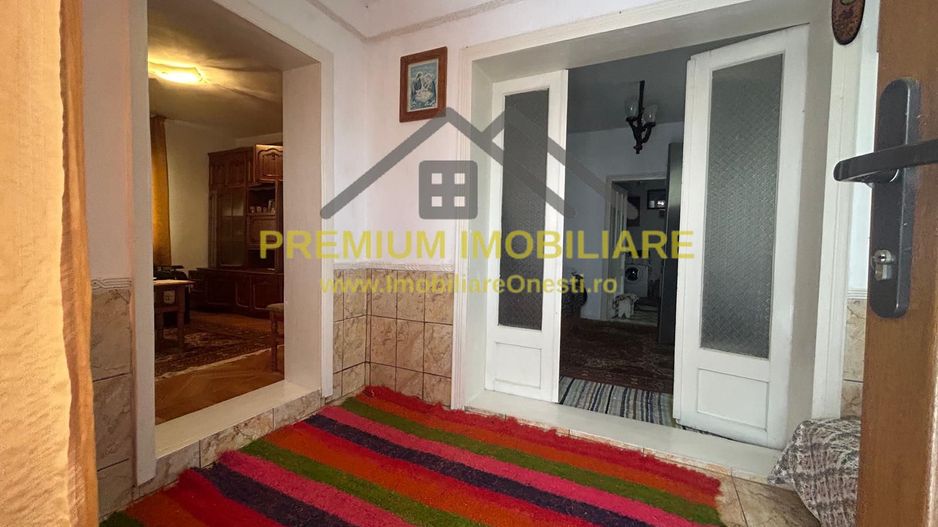 Casă batraneasca+ teren 999 mp intravilan în Oituz - Poză 10