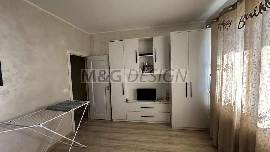 Apartament de vanzare 2 camere Giroc cu gradina 23 mp+2 locuri de paracre. - Poză 1