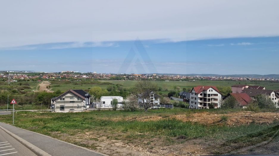 Teren intravilan 517 mp cu utiliati la drum principal in zona Tilisca - Poză 4