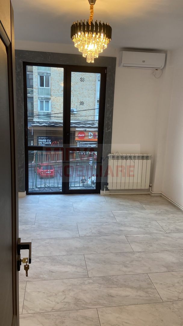 Apartament 2 camere renovat complet | Ultracentral | Vedere Tribunal - Poză 7