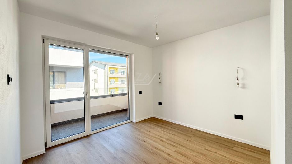 Ap pe 2 niveluri. 4 camere, 2 bai. 2 locuri de parcare. - Poză 5