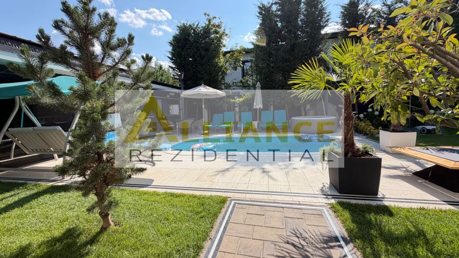 Casa P+1+M cu teren de 650 mp, piscina si curte complet amenajata - Poză 5